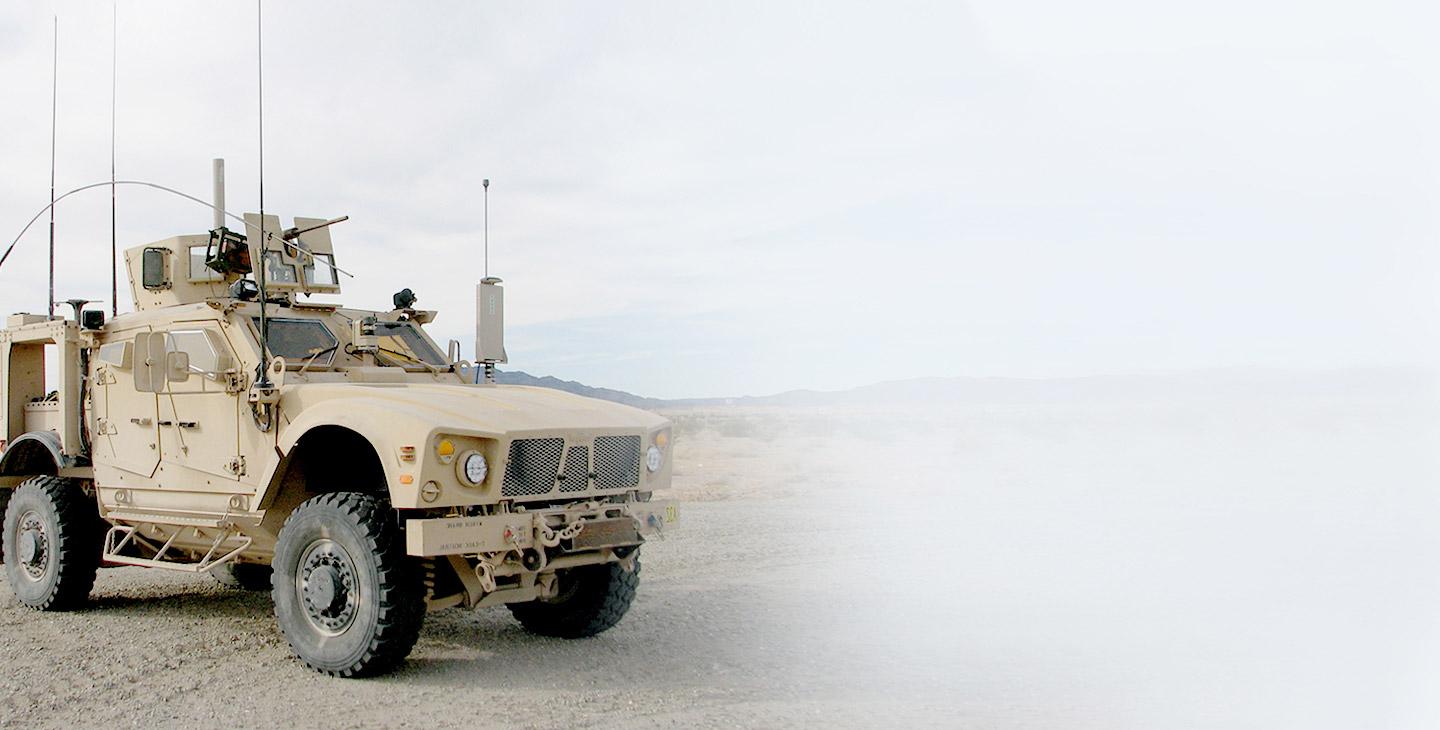 Mine-Resistant, Ambush-Protected (MRAP) parked in the desert 